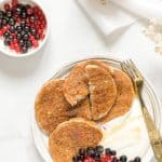 Treat yourself to a chocolatey delight with these indulgent high-protein banana oat pancakes. Drizzled with seasonal berries.