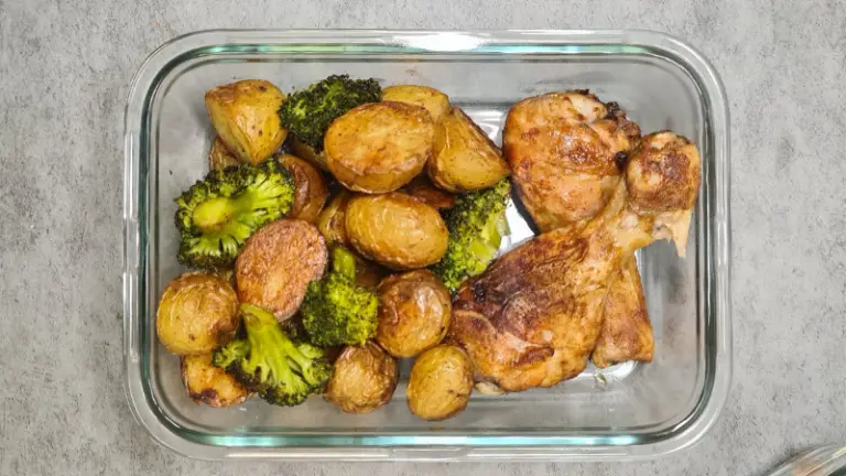 Juicy cayenne pepper chicken drumsticks meal prep recipe with roasted baby potatoes and broccoli.