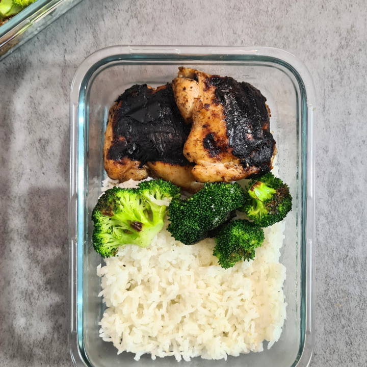 Make weeknight dinners stress-free with our garlic chicken thighs and rice meal prep recipe. Tender chicken, fragrant rice, and crisp broccoli make for a delicious and wholesome meal!